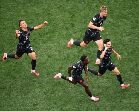 Stephen Eustaquio of Canada celebrates scoring.