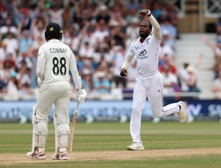 Jofra Archer of England celebrates after taking the wicket of Devon Conway