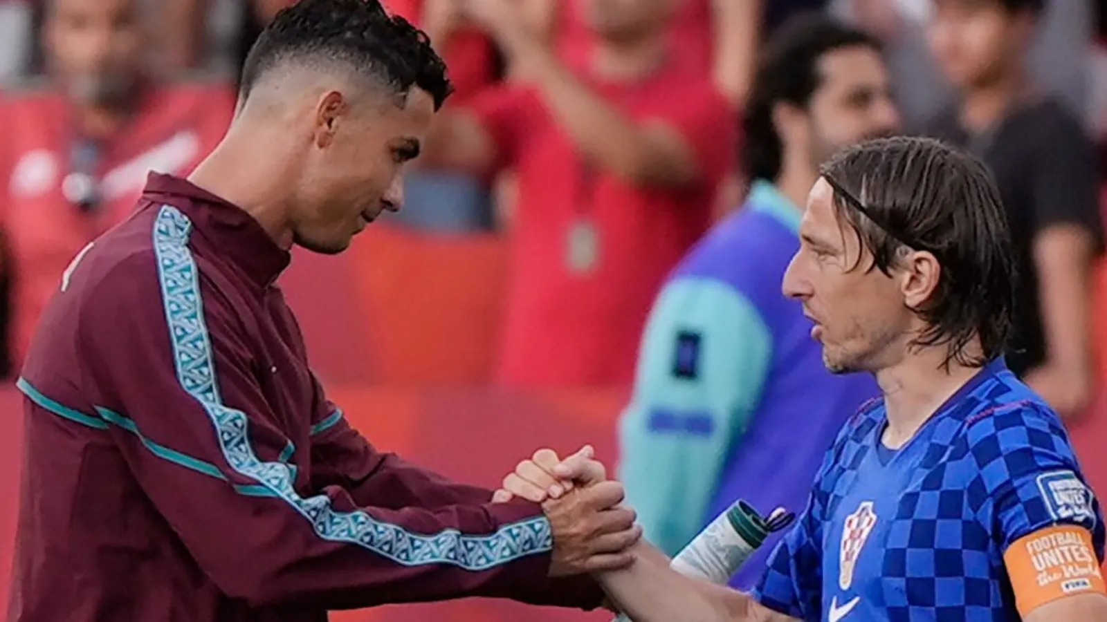 Portugal's Cristiano Ronaldo (7) shakes hands with Croatia's Luka Modric (10) before the World Cup round of 32 soccer match between Portugal and Croatia in Toronto, Thursday, July 2, 2026. (AP Photo/Mike Stewart)